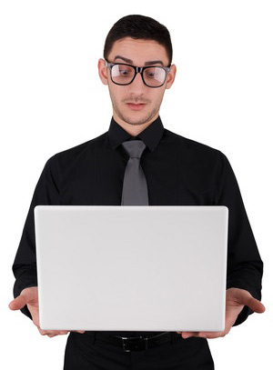 man stock reviewer inspecting computer laptop