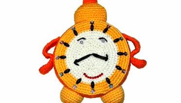 happy knitted clock face person time